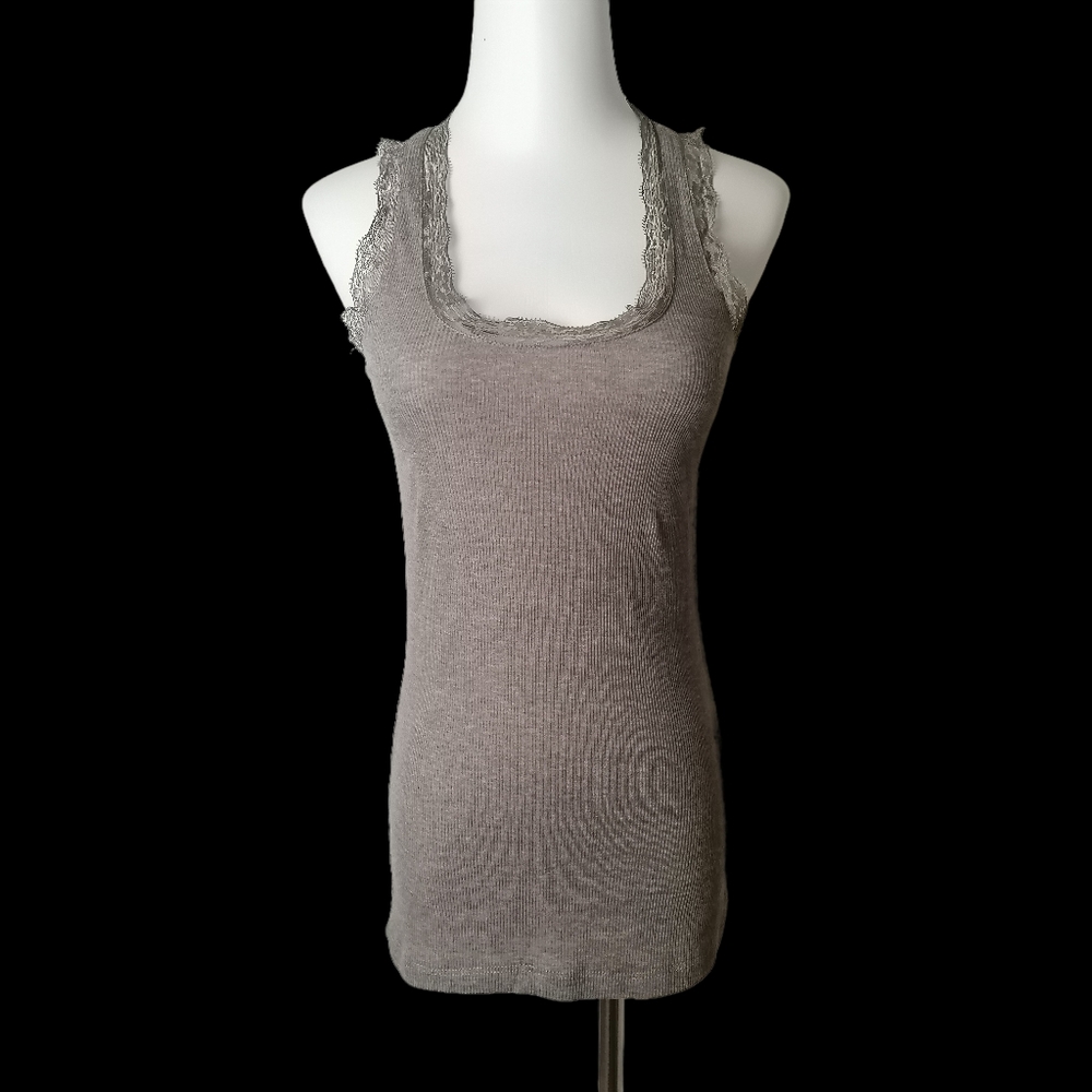 🐨 A taupe-colored tank top with a lace overlay on the back.